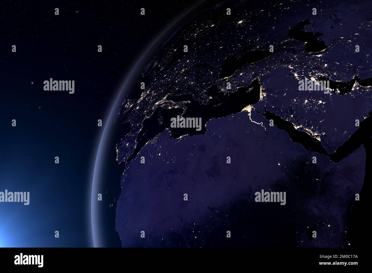 Planet Earth At Night. Africa, Europe, and Asia at night viewed from space with city lights. Germany, France, Romania. Elements furnished by NASA. Stock Photo