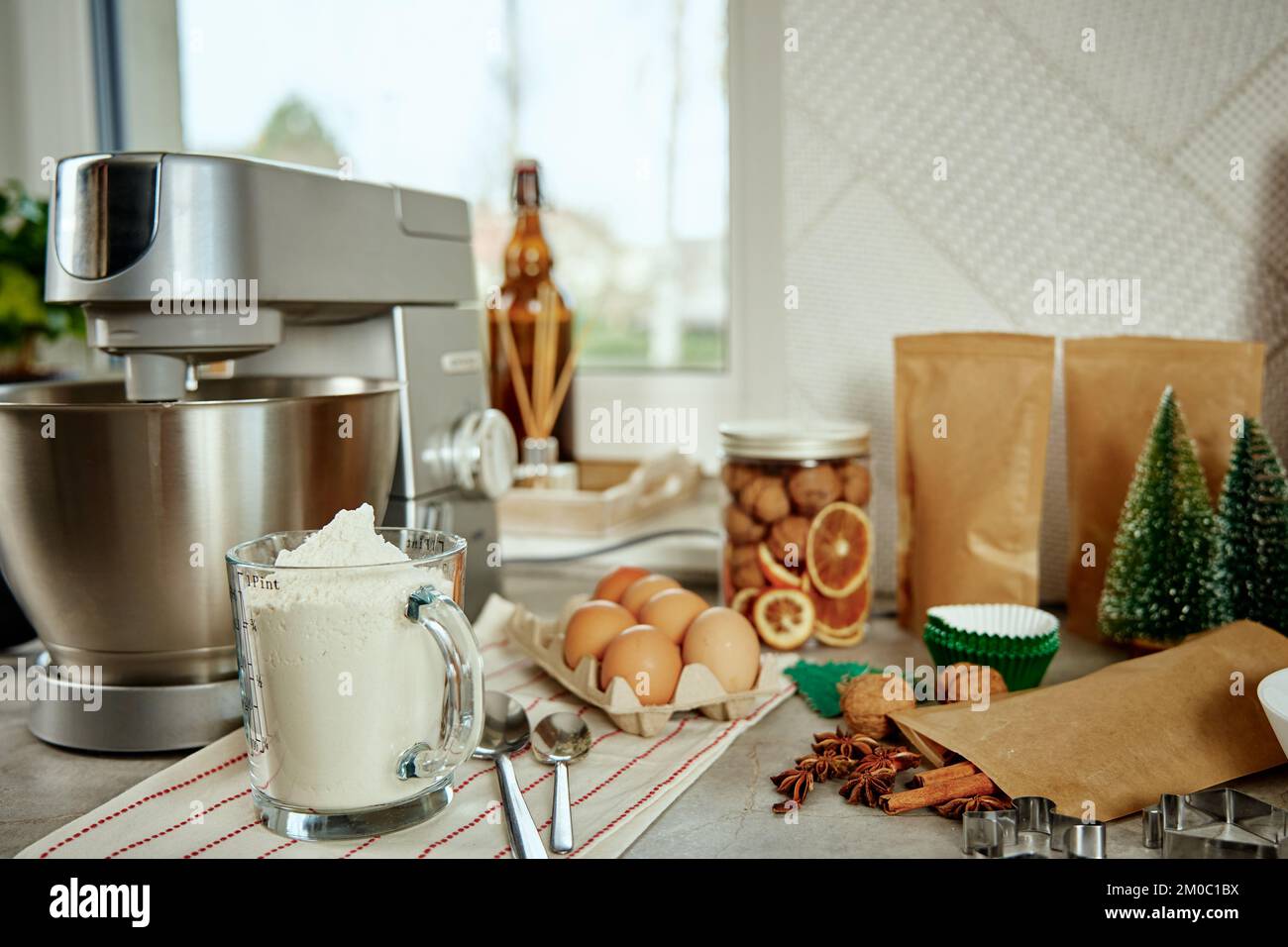 Preparation of dough in an electric mixer at home. Professional mixer