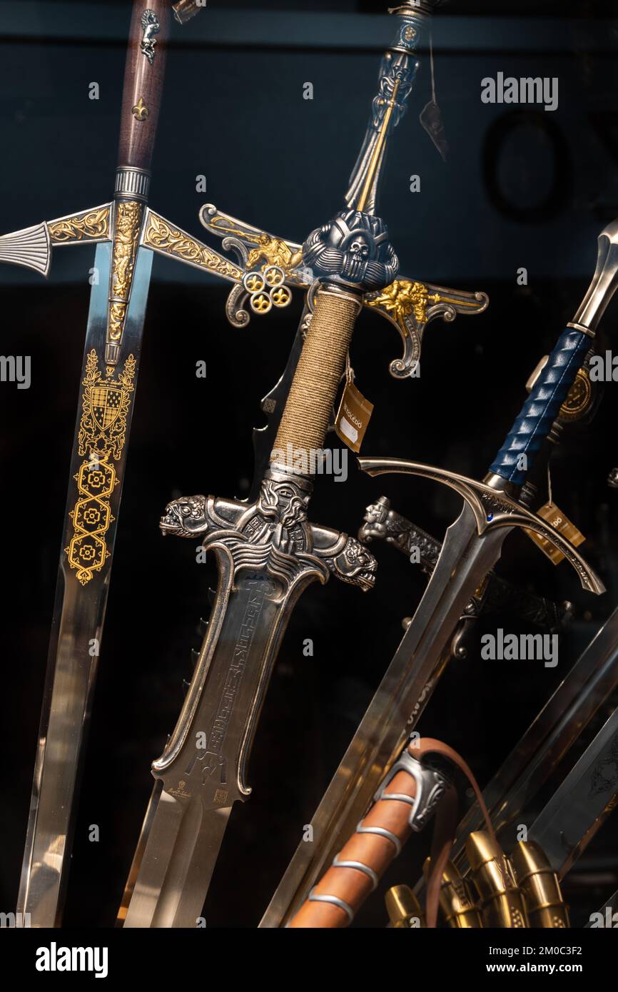 Replicas of swords from Conan the Barbarian and Lord of the Rings movies. Stock Photo