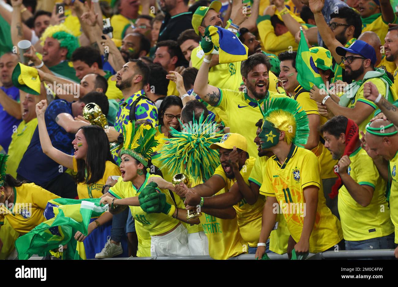Doha, Qatar, 5th December 2022.  Brazil fans celebrate the first goal during the FIFA World Cup 2022 match at Stadium 974, Doha. Picture credit should read: David Klein / Sportimage Stock Photo