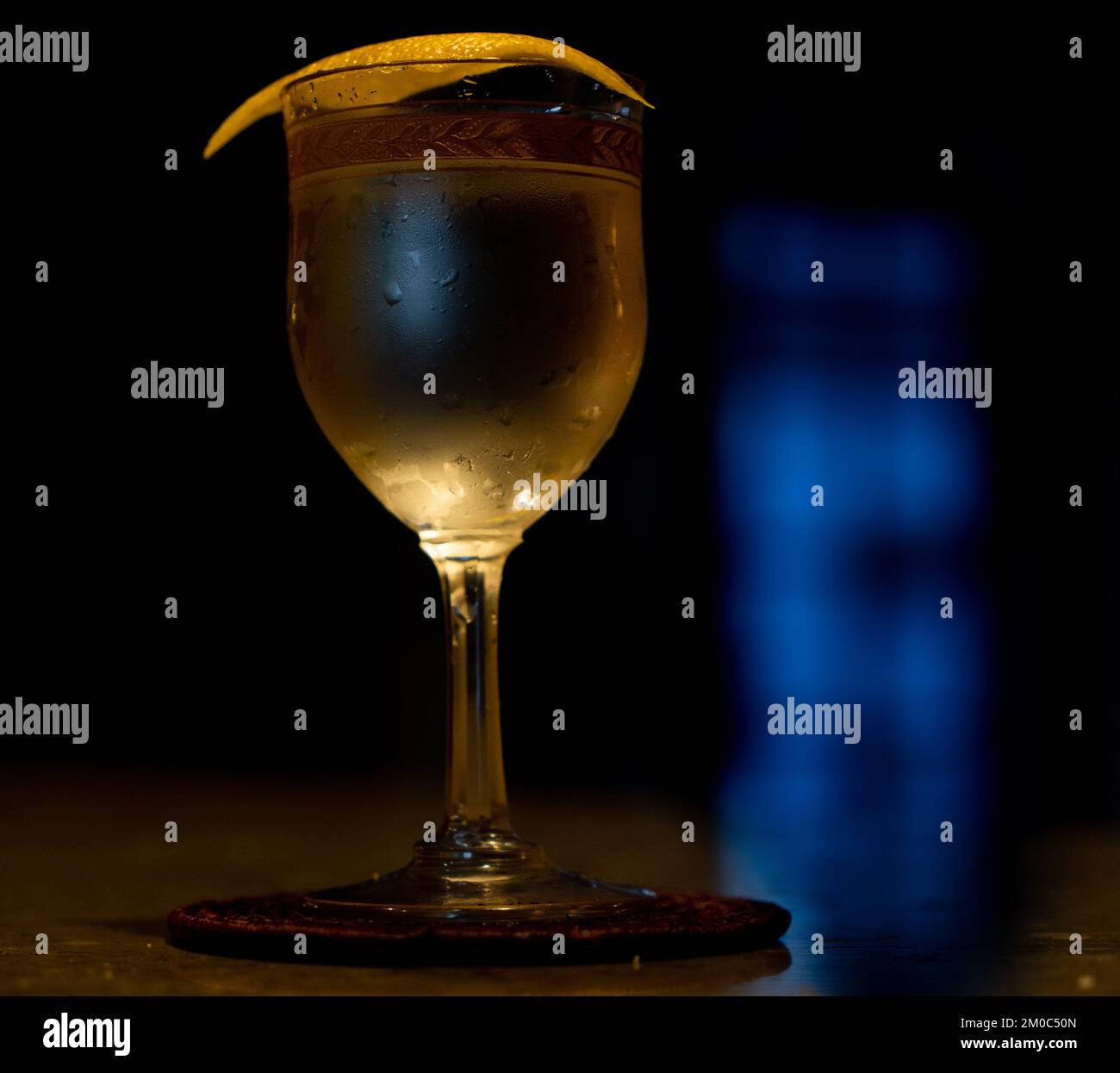 Gin Martini, a dash of orange bitters, and a lemon twist. Appropriately