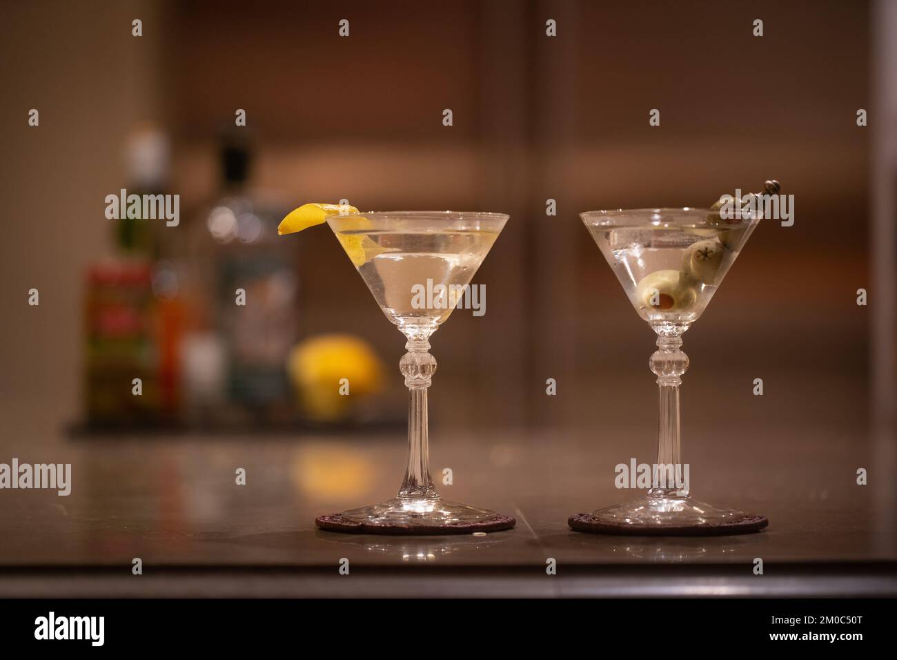 Wet martini with a lemon twist, the drink on the right is my dirty