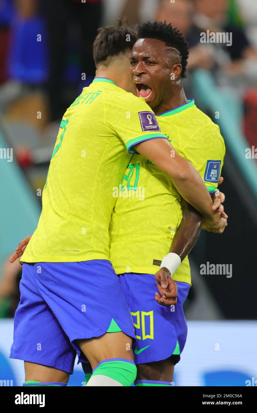 Qatar, 05/12/2022, Doha, Qatar. 05th Dec, 2022. Vinicius Junior of Brazil scores a goal and celebrates with Lucas Paqueta of Brazil during the FIFA World Cup Qatar 2022 match between Brazil and South Korea at Stadium 974, Doha, Qatar on 5 December 2022. Photo by Peter Dovgan. Editorial use only, license required for commercial use. No use in betting, games or a single club/league/player publications. Credit: UK Sports Pics Ltd/Alamy Live News Stock Photo