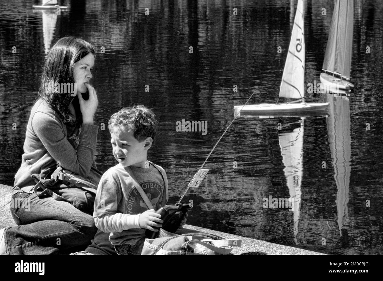 Model sailboats in the Conservatory Water in Central Park, New York, Manhattan, New York, USA Stock Photo