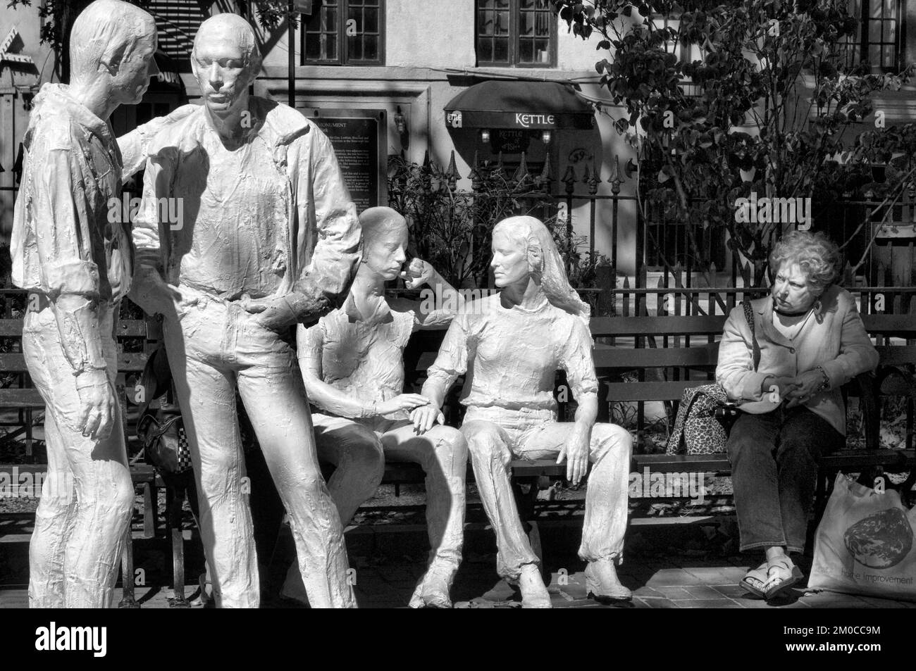 White statues in the square of Christopher Park in Greenwich Village