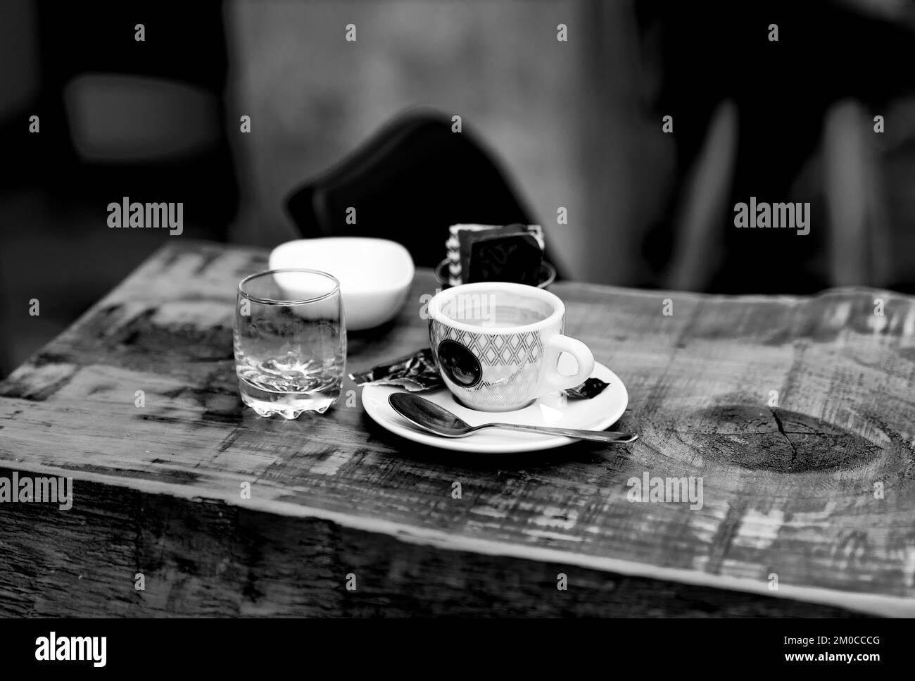 Espresso cup on table in black and white Stock Photo