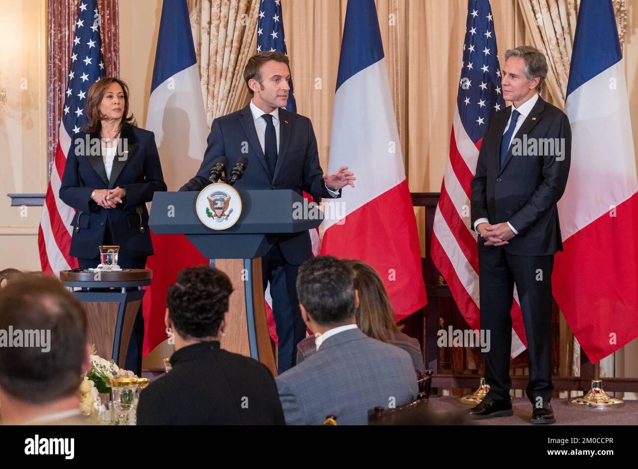 French President Macron Delivers Remarks at the State Luncheon Secretary of State Antony J. Blinken and Vice President Kamala Harris host a State Luncheon in honor of French President Emmanuel Macron at the U.S. Department of State in Washington, D.C., on December 1, 2022. [State Department Photo by Ron Przysucha] Stock Photo