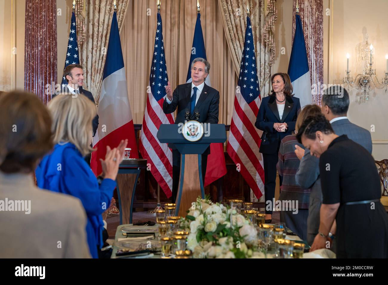 Secretary Blinken and Vice President Harris Co-Host a State Luncheon in Honor of French President Macron Secretary of State Antony J. Blinken and Vice President Kamala Harris host a State Luncheon in honor of French President Emmanuel Macron at the U.S. Department of State in Washington, D.C., on December 1, 2022. [State Department Photo by Ron Przysucha] Stock Photo