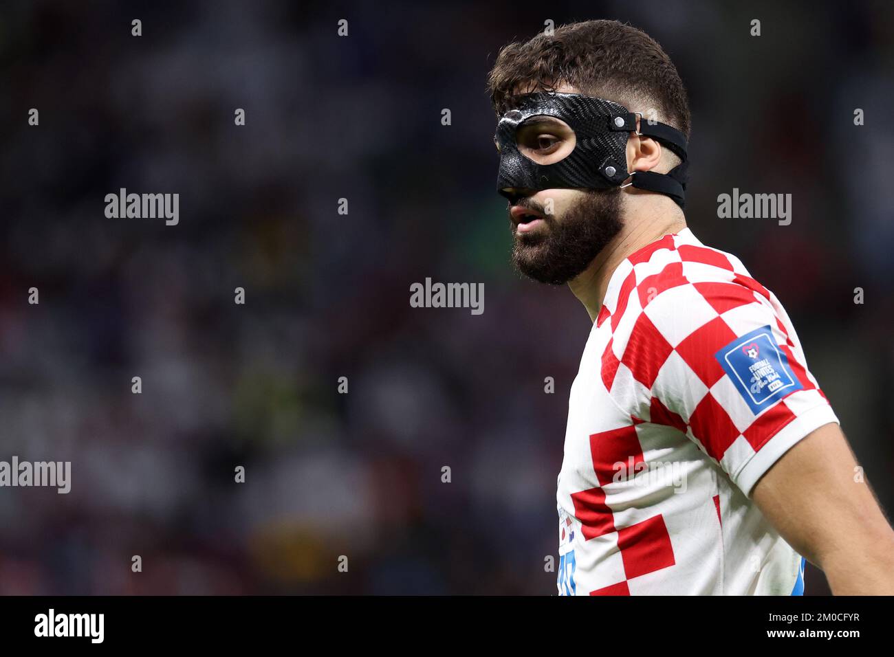 Al Wakrah, Qatar. 05/12/2022, Josko Gvardiol of Croatia wears a mask during the FIFA World Cup