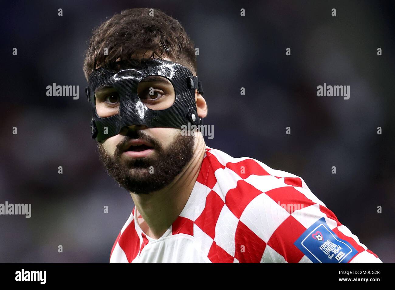 Al Wakrah, Qatar. 05/12/2022, Josko Gvardiol of Croatia wears a mask during the FIFA World Cup