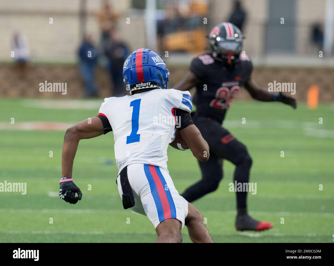 Georgetown Texas USA, December 3 2022: Offensive player gains yardage during a University Scholastic League (UIL) quarter-final playoff football game in central Texas. ©Bob Daemmrich Stock Photo