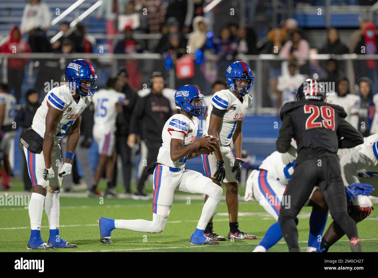 Victory Formation Duncanville High School quarterback takes a knee as time runs out in ...