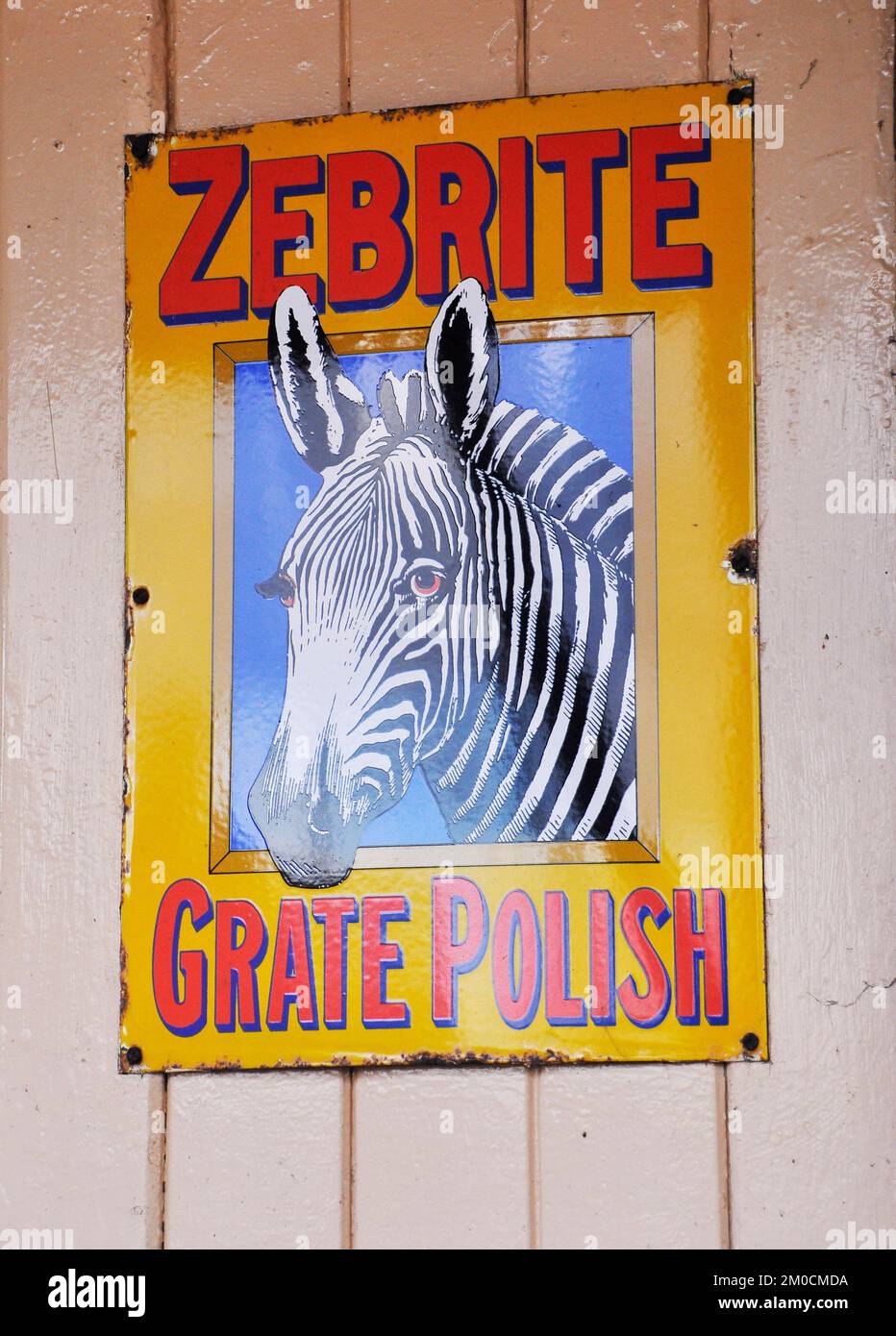 Enamelled metal sign, advertising Zebra grate polish photographed at Tenterden railway station in Kent,England, UK Stock Photo