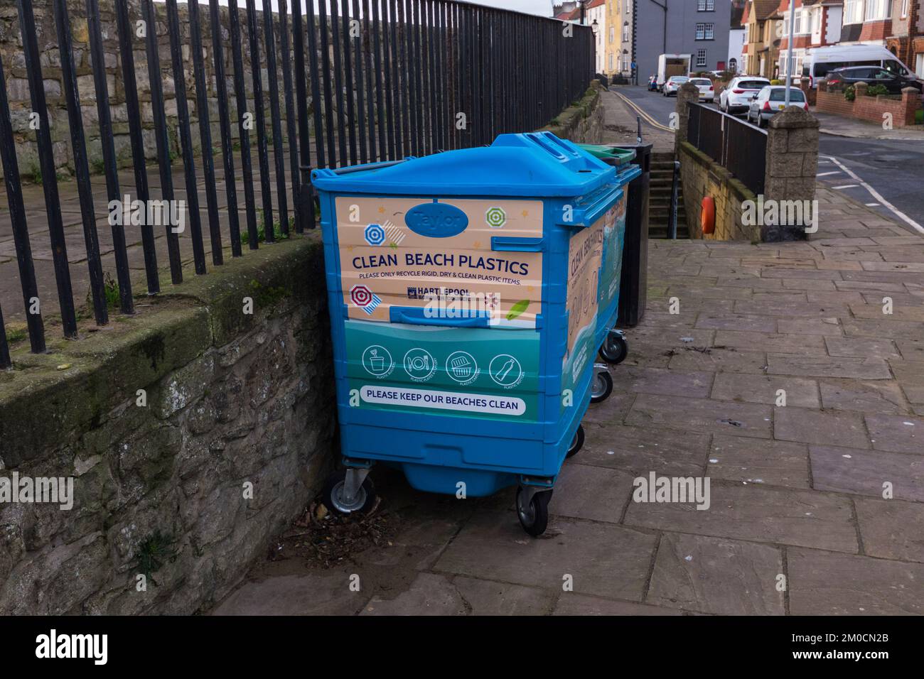 A wheely bin on the seafront at Hartlepool,England,UK specifically for plastic waste to stop beach pollution Stock Photo