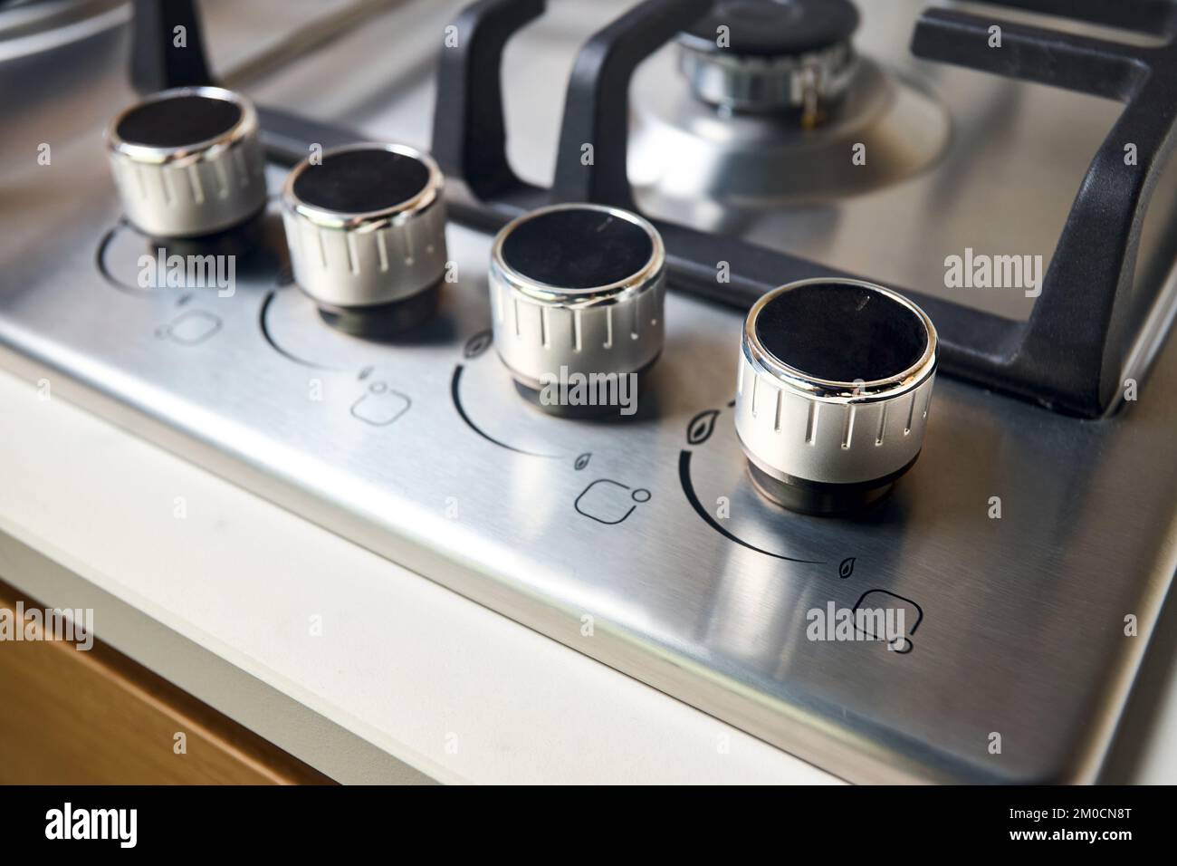 Hob cooker stove oven made of stainless steel with control knobs