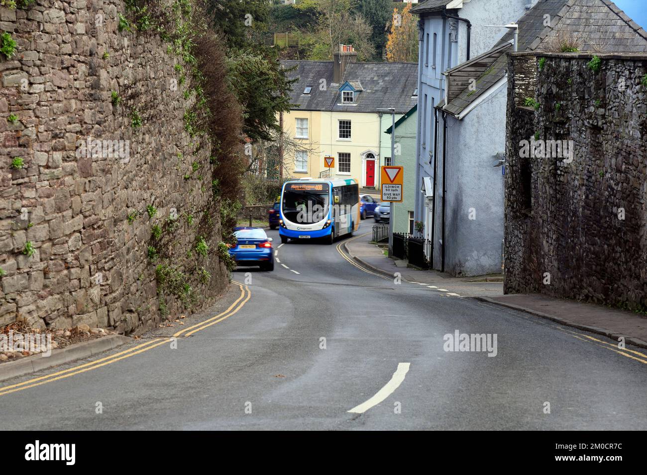 Rural bus wending its way around a winding road in Brecon town. 40B Stagecoach route - Maes y Ffynnon bus Brecon, Powys, Wales. December 2022. Winter. Stock Photo