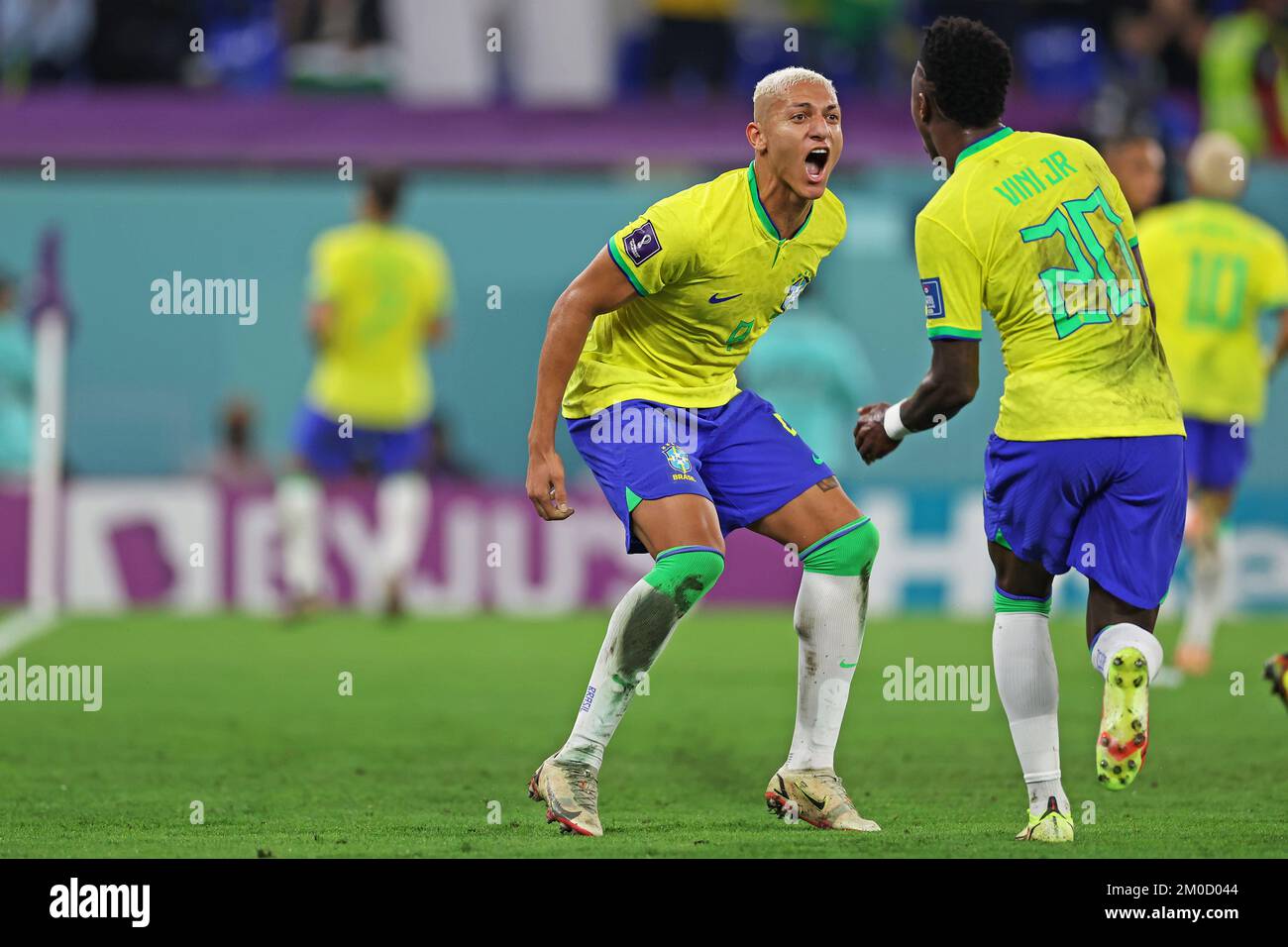 Doha, Qatar: 5th December 2022; FIFA World Cup final 16 round, Brazil versus South Korea: Richarlison and Vin&#xed;cius Jr. of Brazil ce;lebrates the goal for 4-0 by Lucas Paquetá Stock Photo