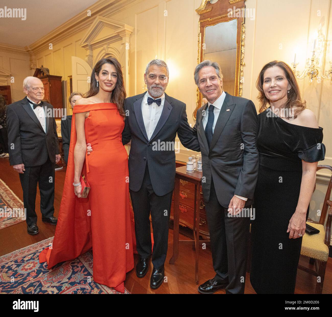Actor George Clooney and his wife, Amal Clooney at the Kennedy Center Honors Dinner. Secretary of State Antony J. Blinken delivers remarks at the Kennedy Center Honors Dinner in Washington, DC., on December 3, 2022. Stock Photo