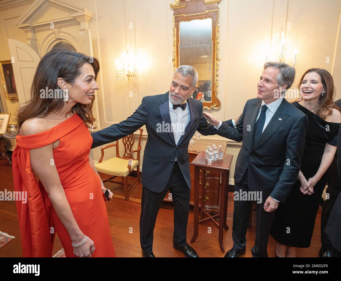 Actor George Clooney and his wife, Amal Clooney at the Kennedy Center Honors Dinner. Secretary of State Antony J. Blinken delivers remarks at the Kennedy Center Honors Dinner in Washington, DC., on December 3, 2022. Stock Photo