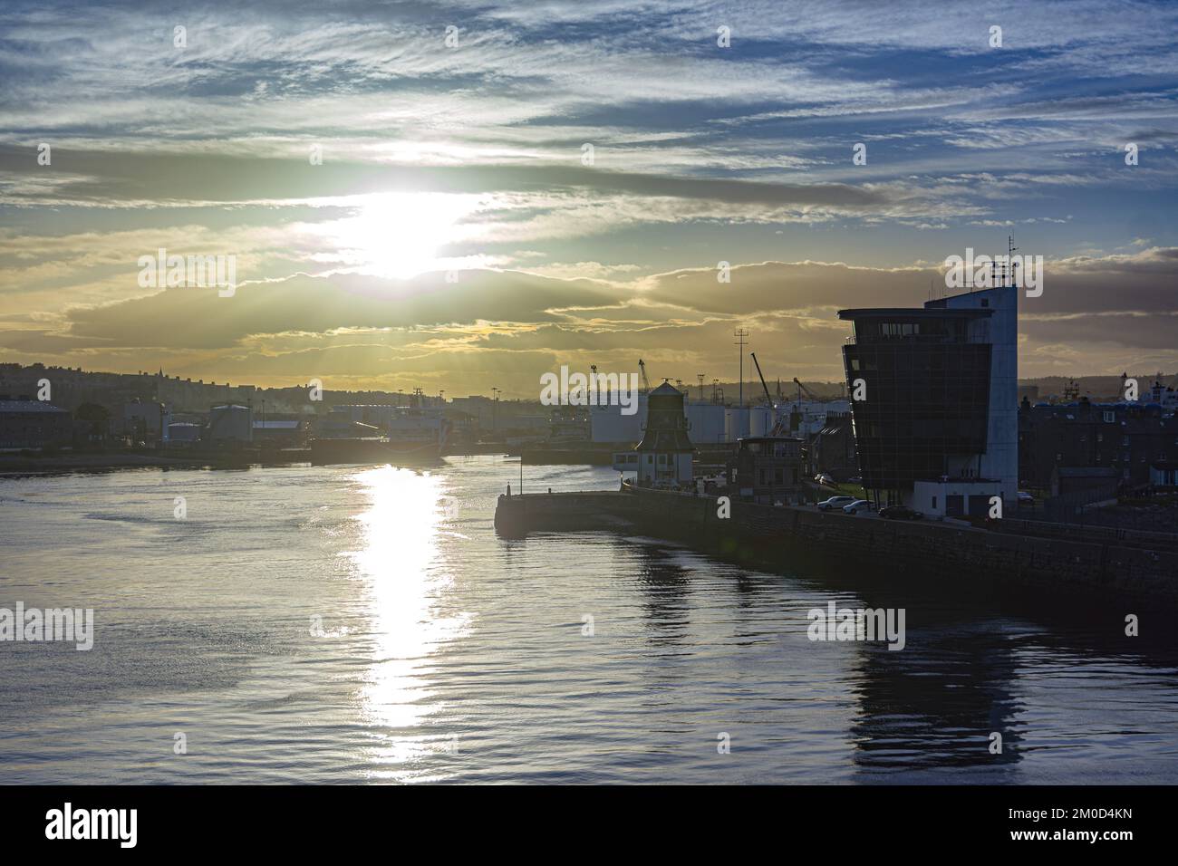 Aberdeen harbor, afternoon sun. Passing the modern VTS tower at the