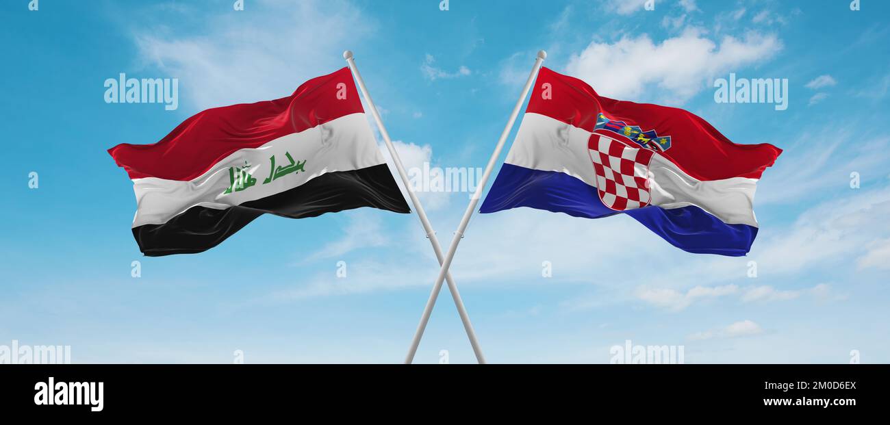two crossed flags Croatia and Iraq waving in wind at cloudy sky ...