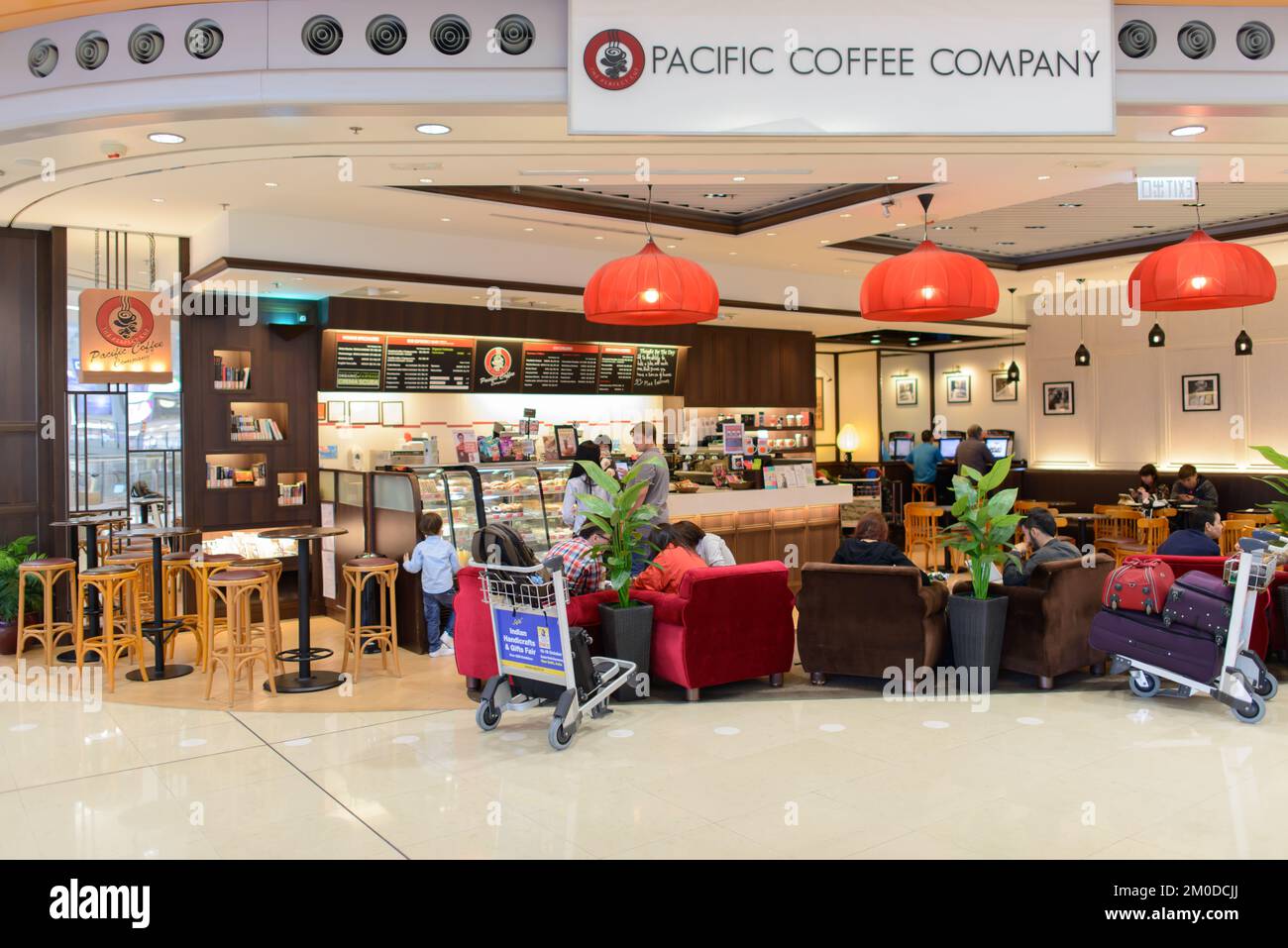 HONG KONG - APRIL 01: Pacific Coffee cafe in airport on April 01, 2014 in Hong Kong, China. Pacific Coffee Company is a Pacific Northwest U.S.-style c Stock Photo
