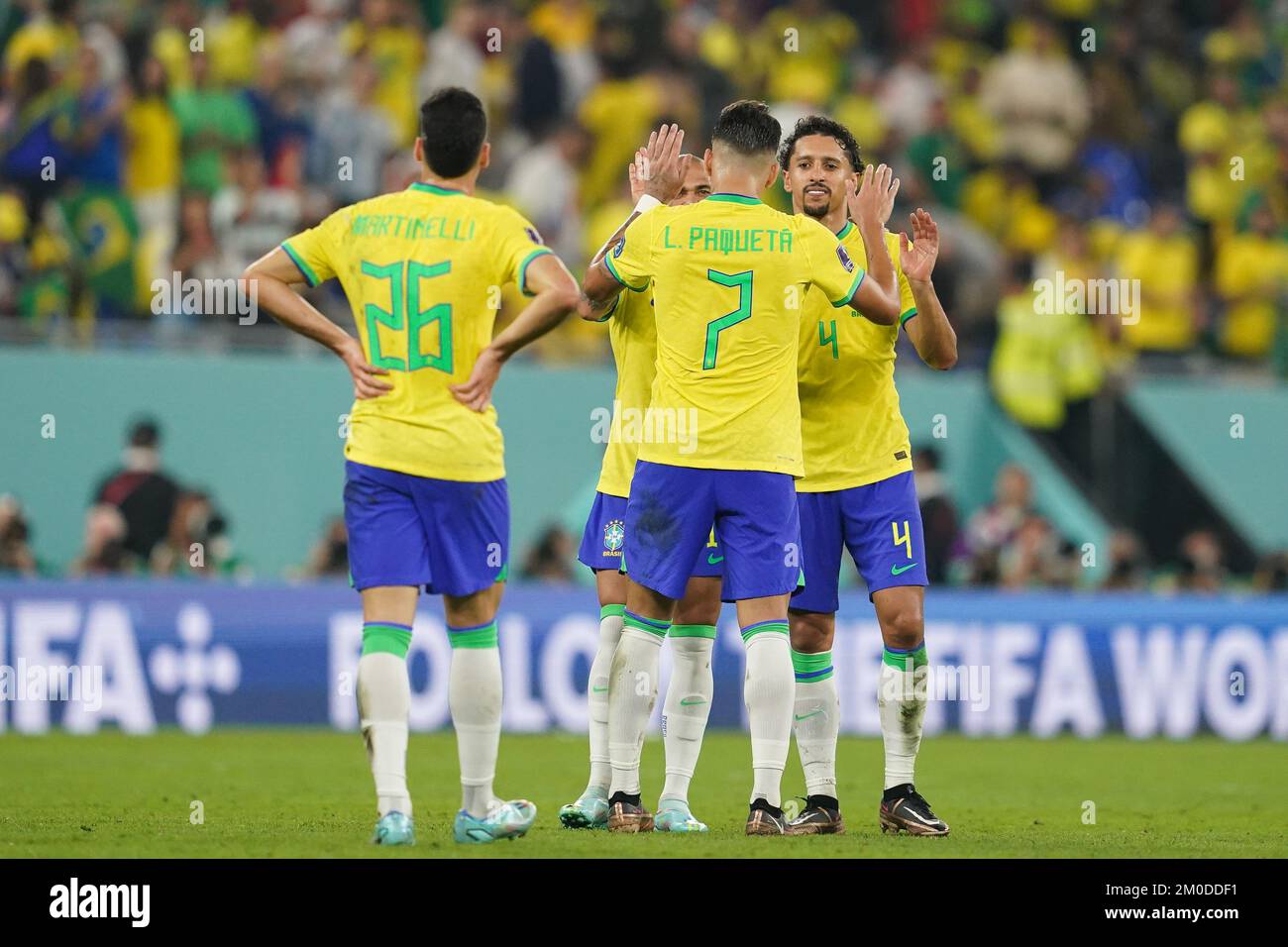 Doha, Qatar. 05th Dec, 2022. Stadium 974 DOHA, QATAR - DECEMBER 5: Players of Brazil Gabriel Martinelli, Lucas Paquetá, Dani Alves and Marquinhos celebrate the victory after the FIFA World Cup Qatar 2022 Round of 16 match between Brazil and South Korea at Stadium 974 on December 5, 2022 in Doha, Qatar. (Photo by Florencia Tan Jun/PxImages) (Florencia Tan Jun/SPP) Credit: SPP Sport Press Photo. /Alamy Live News Stock Photo