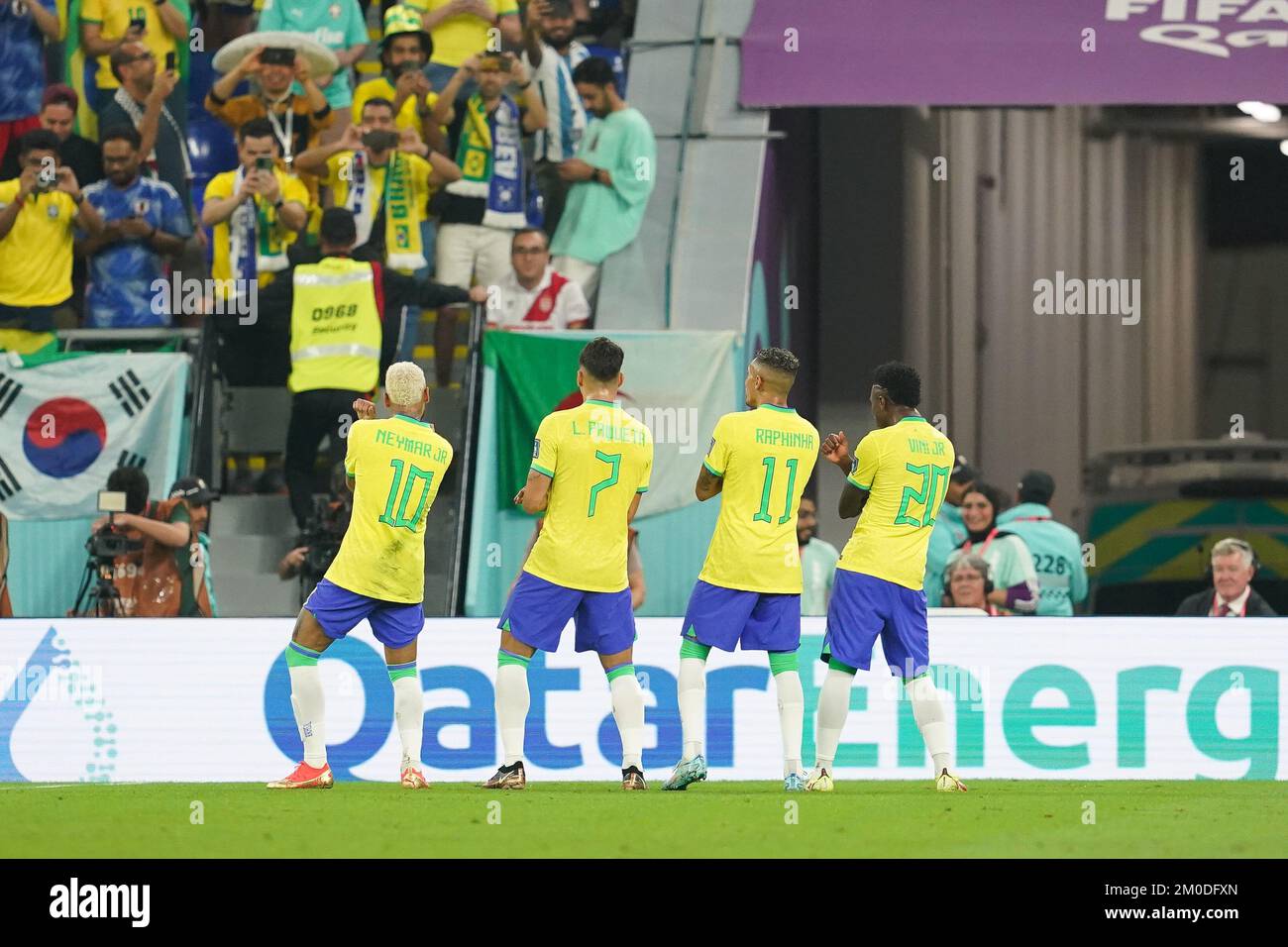 DOHA, QATAR - DECEMBER 5: Player of Brazil Lucas Paquetá with his teammates Neymar, Raphinha and Vinícius Júnior after scoring a goal during the FIFA World Cup Qatar 2022 Round of 16 match between Brazil and South Korea at Stadium 974 on December 5, 2022 in Doha, Qatar. (Photo by Florencia Tan Jun/PxImages) Stock Photo