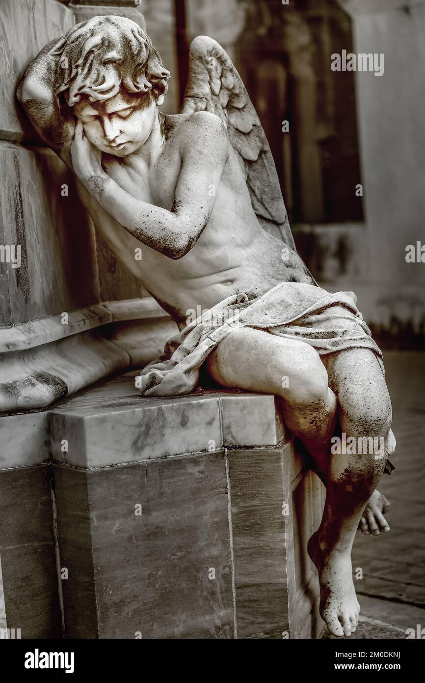 Young sad and beautiful fragile Angel, Recoleta cemetery, Buenos Aires Stock Photo