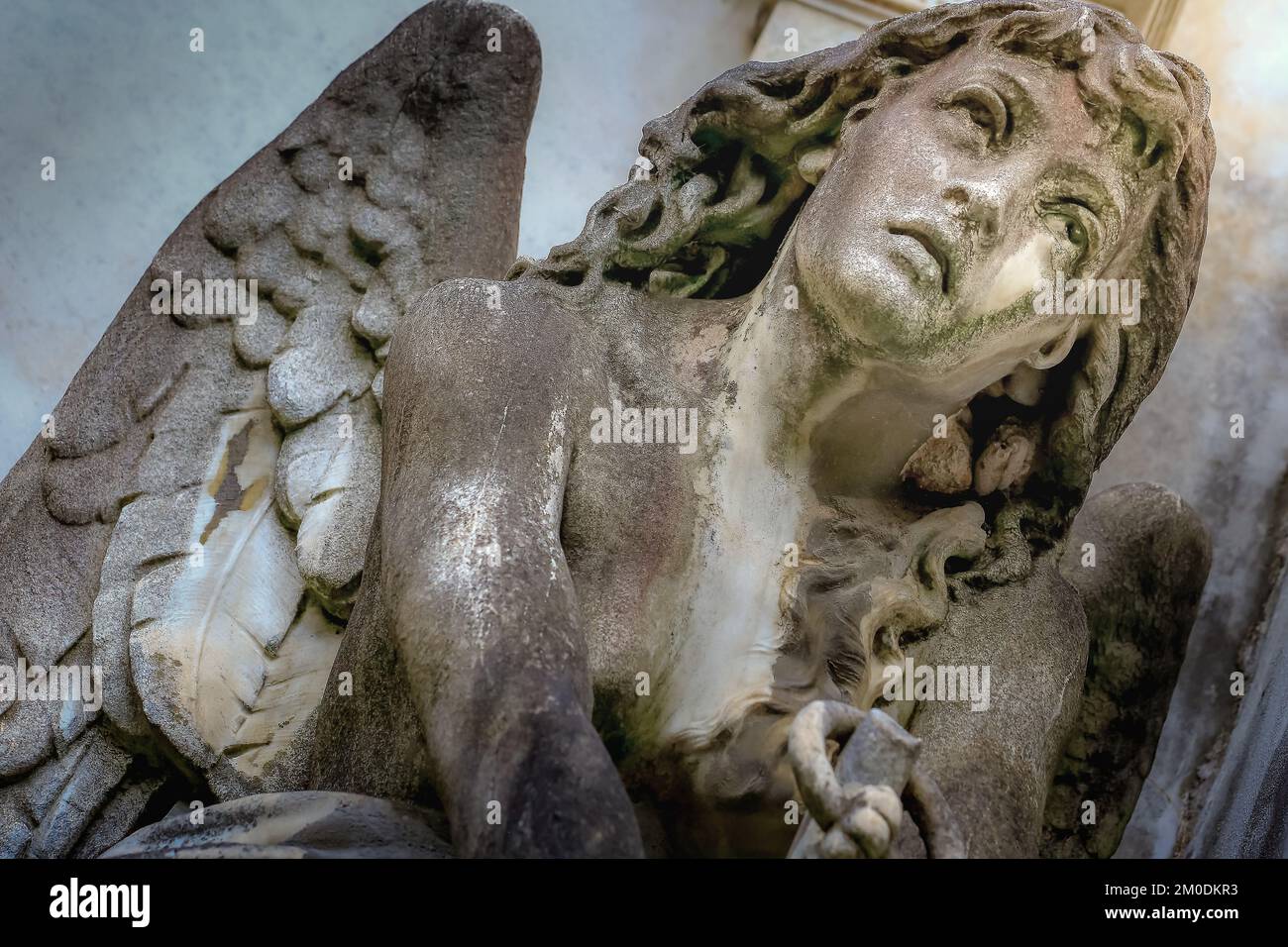 Young sad and beautiful fragile Angel, Recoleta cemetery, Buenos Aires Stock Photo
