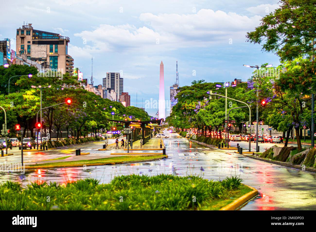 Obelisco. The Obelisk and 9 de Julio Avenue (the widest avenue in the world, with 140 meters) on a rainy day. Buenos Aires, Argentina. Stock Photo