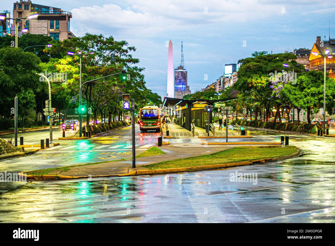 Obelisco. The Obelisk and 9 de Julio Avenue (the widest avenue in the world, with 140 meters) on a rainy day. Buenos Aires, Argentina. Stock Photo