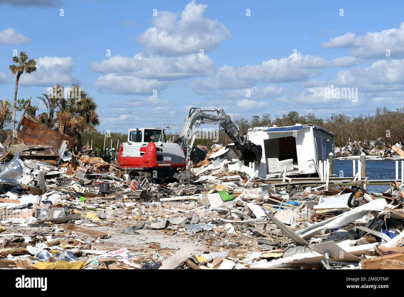 Bonita Springs, FL, USA--November 4, 2022--Crews work to cleanup debris 