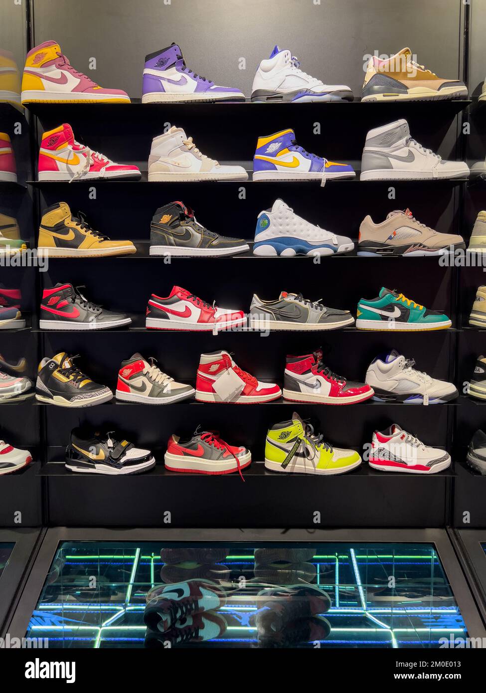 Nike footwear such as Air Jordan 1, Jordan 1 Low on shelf display for customers to select the colours they like. Stock Photo