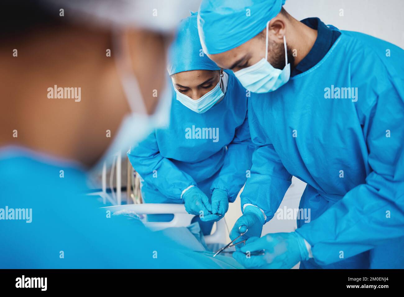 Surgery, medical operation and doctors with patient in emergency room