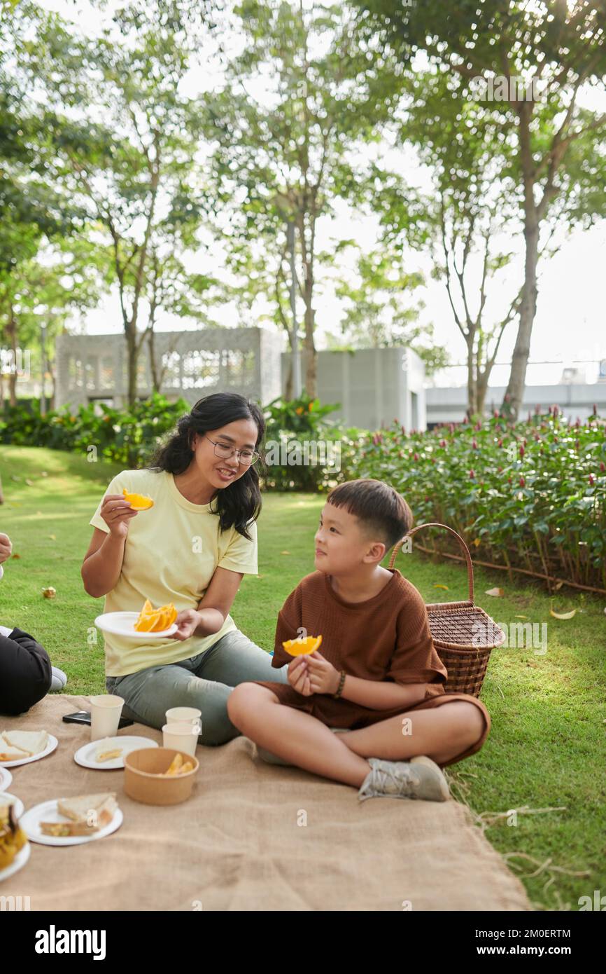 Asian family picnic fruit hi-res stock photography and images - Alamy