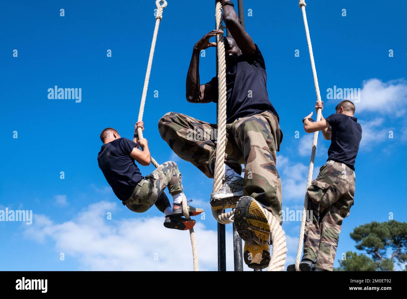 Military soldier training rope climbing hi-res stock photography