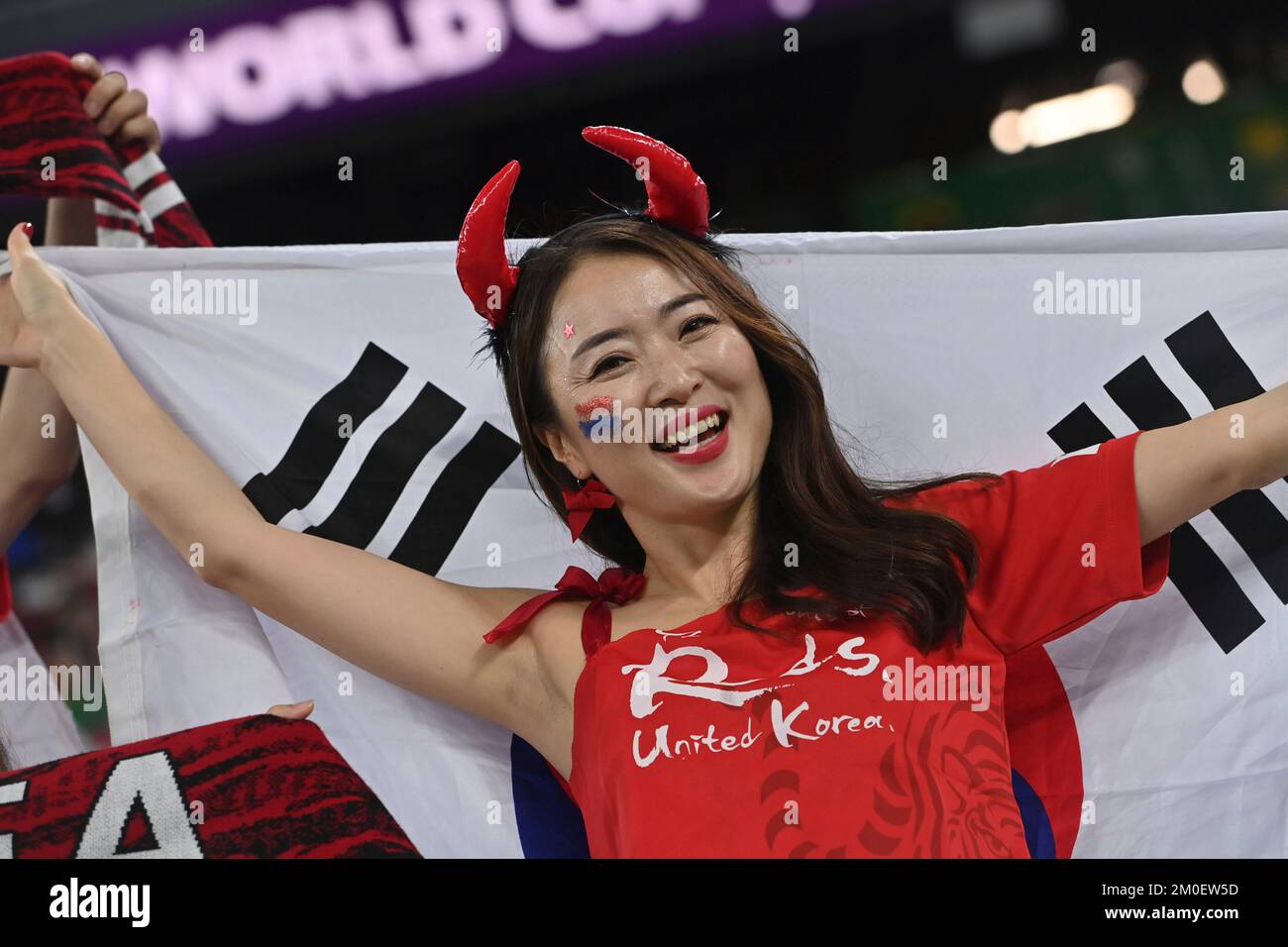 A female South Korean football fan holds up a Korean national flag before  the Group F match between Sweden and South Korea during the FIFA World Cup  2 Stock Photo - Alamy