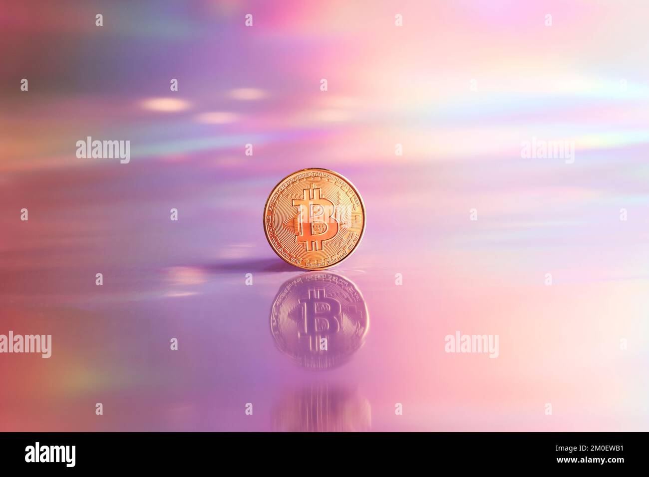 Golden bitcoin coin on holographic, abstract, neon background. digital currency, business style. Mining and trade bitcoin concept. Stock Photo