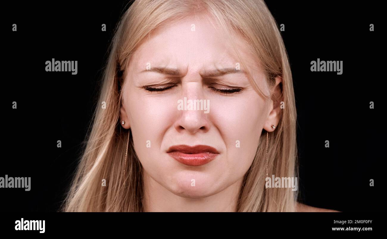 sad woman crying, looking aside on black background, closeup portrait,  profile view Stock Photo - Alamy