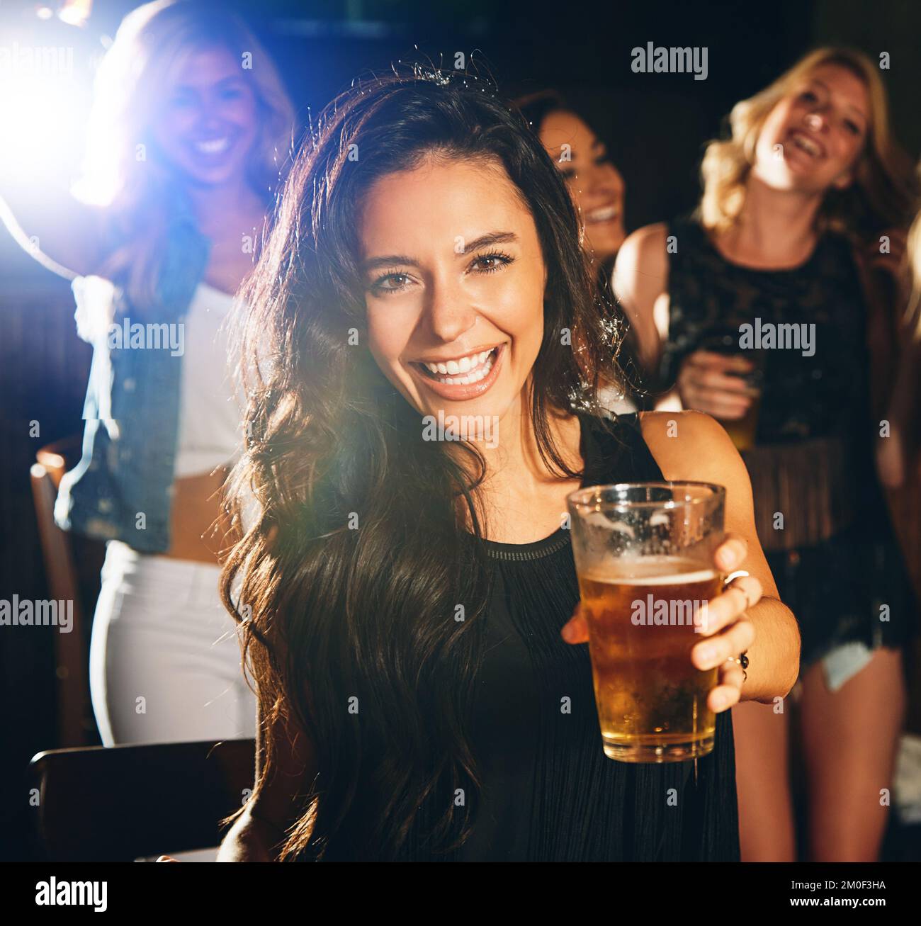 Happy, beer and woman portrait in a for new years, social of