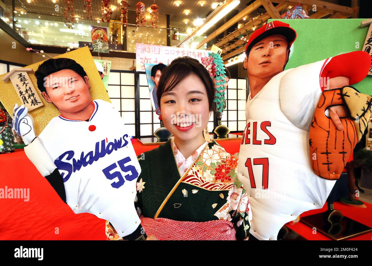 Tokyo, Japan. 6th Dec, 2022. Japanese doll maker Kyugetsu employee displays ornamental wooden