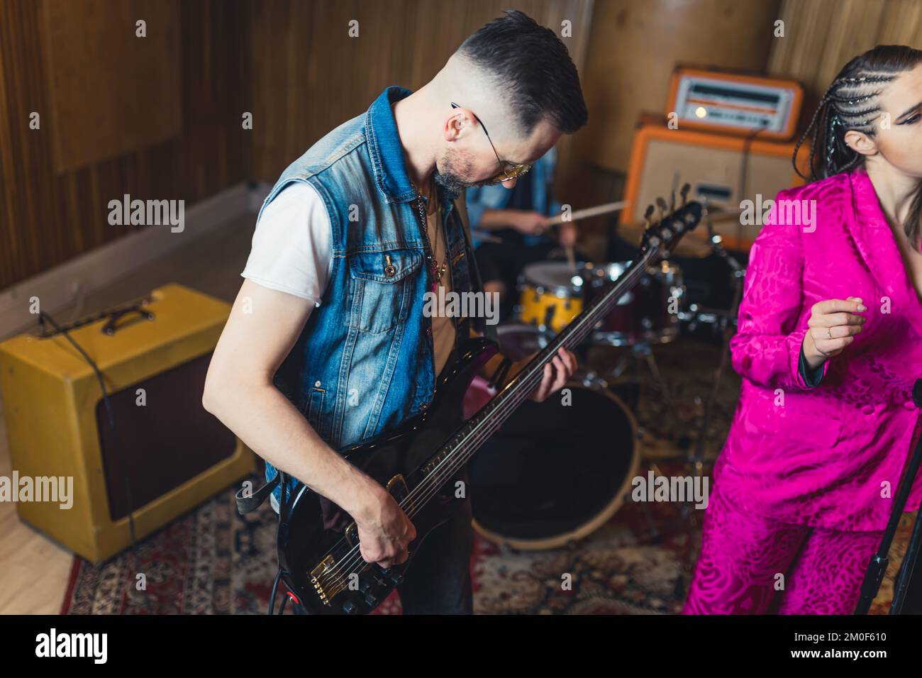 Guitarist accompanying a female singer. High quality photo Stock Photo