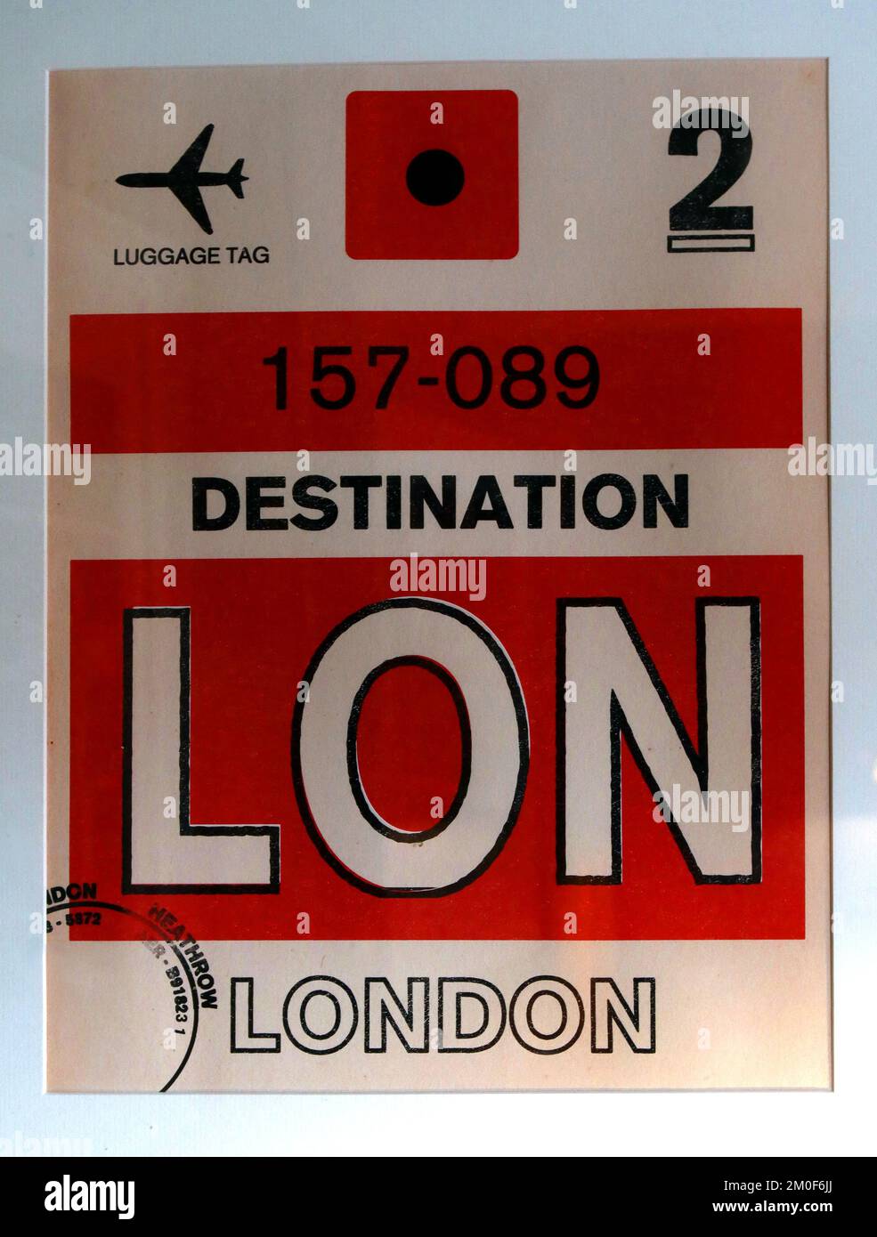 Framed London Heathrow, 2nd class luggage tag, 157-089, destination LON Stock Photo