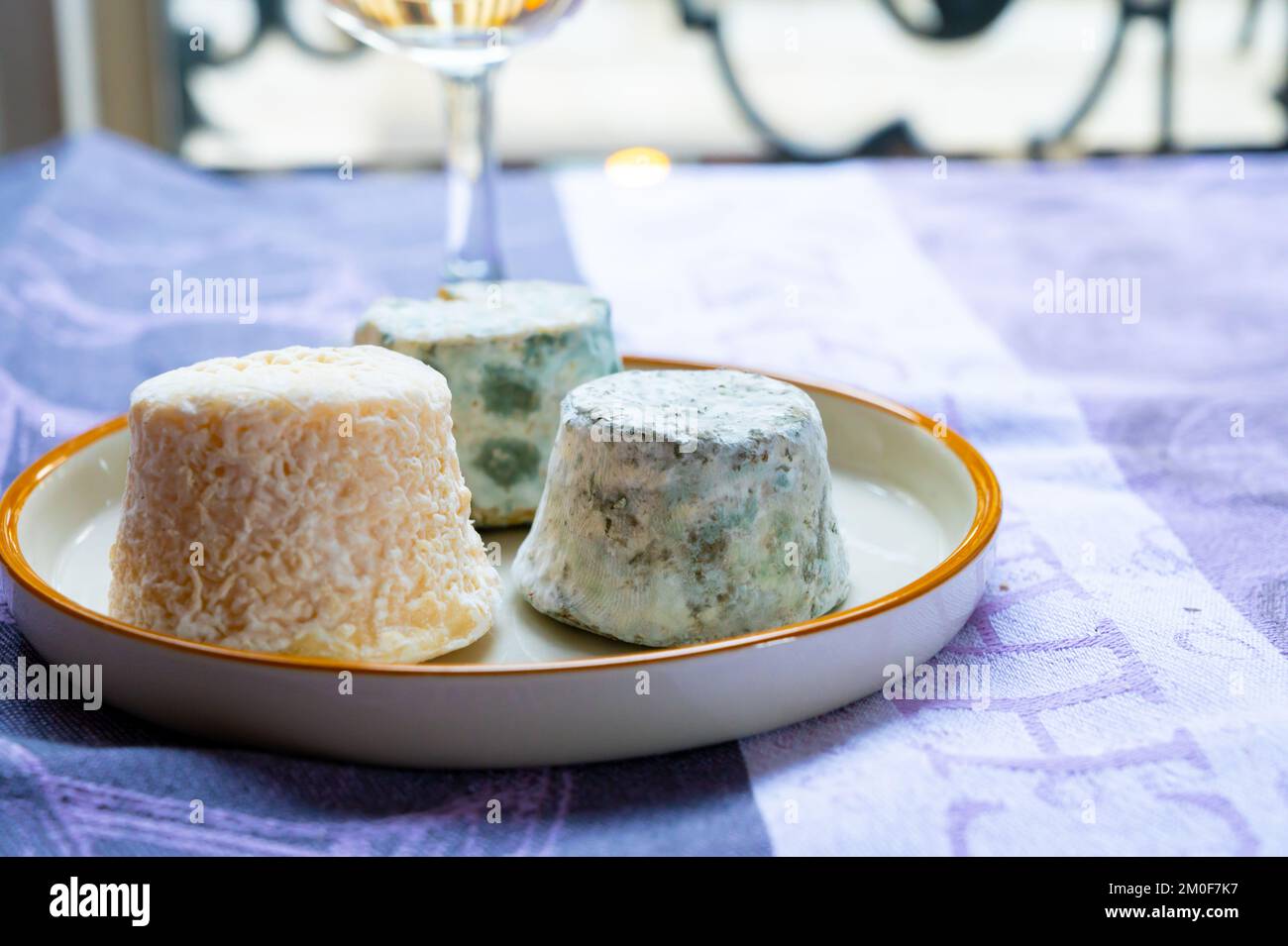 Small french goat cheeses, matured and with grey mold from Macon
