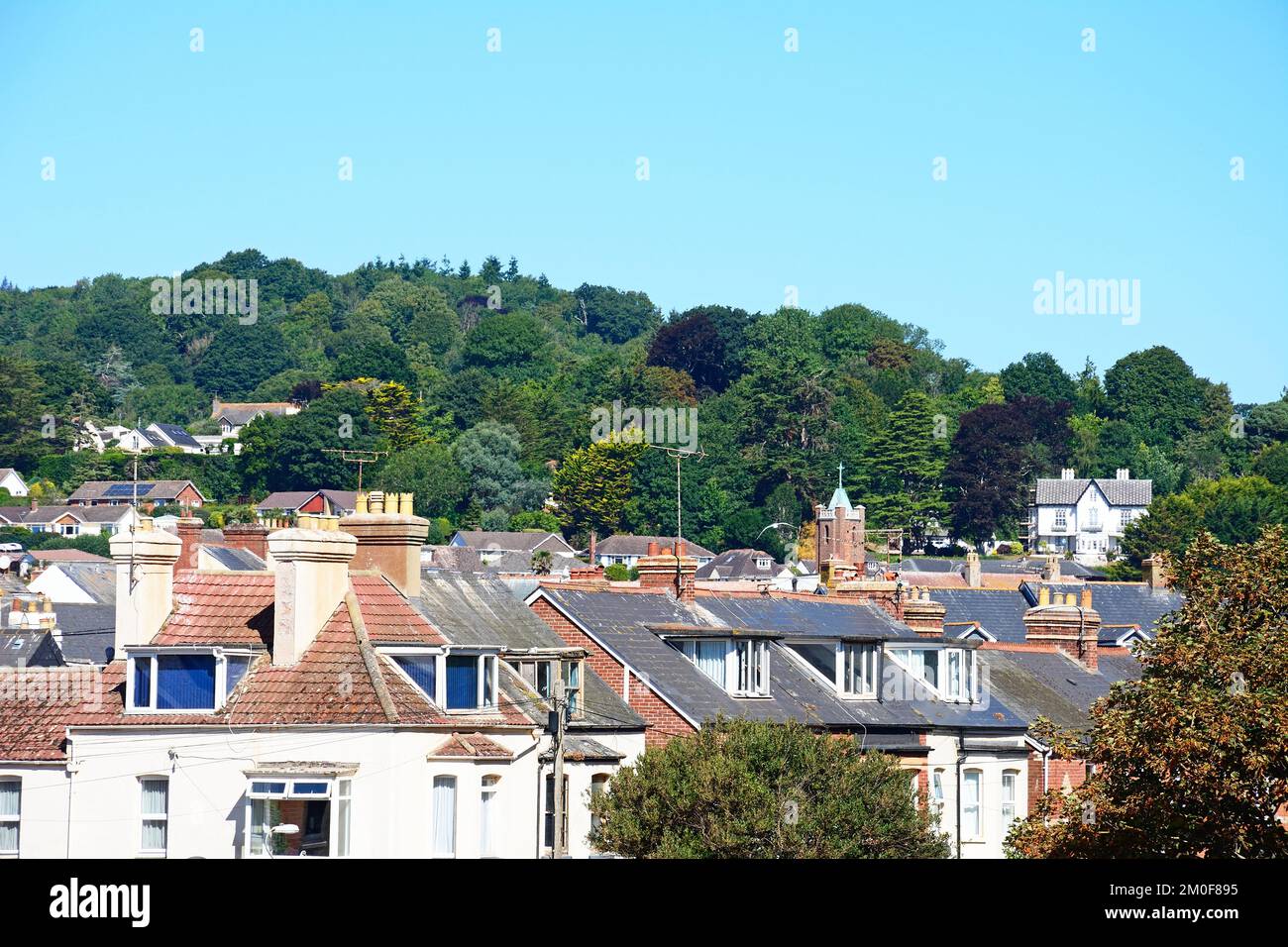 Elevated view over the town rooftops with the Devon countryside to the rear, Sidmouth, Devon, UK, Europe Stock Photo