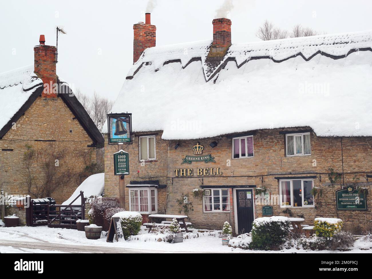 The Bell Public House. A snowy scene. An old inn or public house