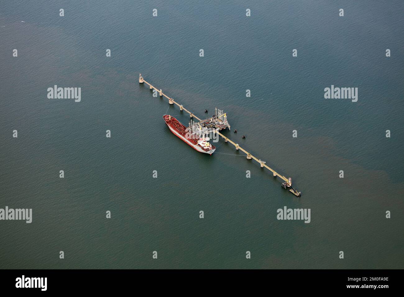 Oil and chemical tanker 'Atlantic Twin' at unloading pier near Wilhelmshaven, 28.10.2022, aerial photo, Germany, Lower Saxony, Wilhelmshaven Stock Photo