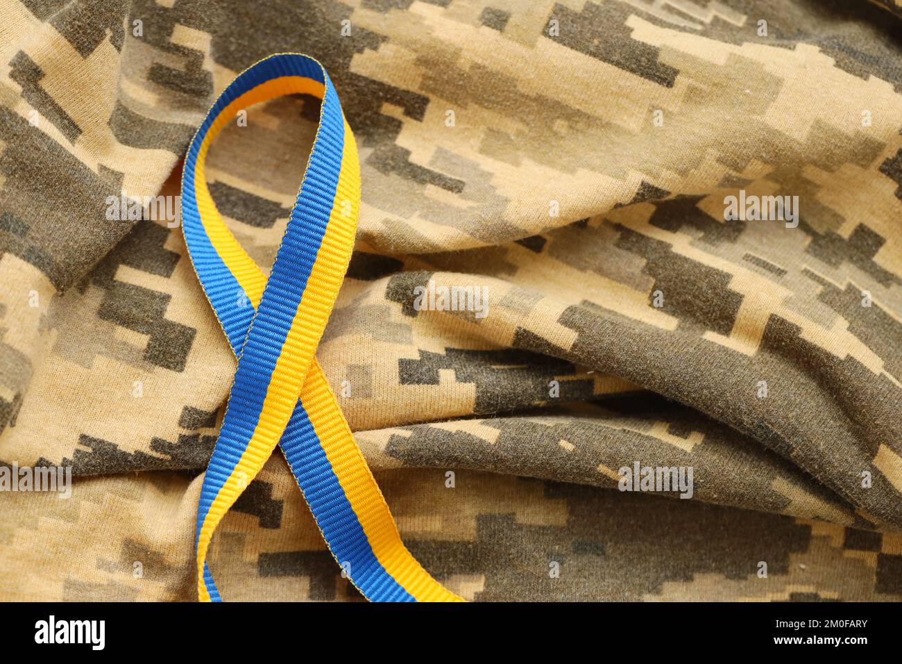 Pixeled digital military camouflage fabric with ribbon in blue and ...