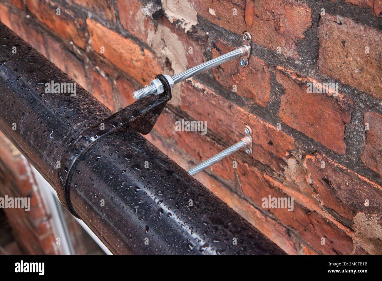 External wall insulation pipe stand off Stock Photo Alamy